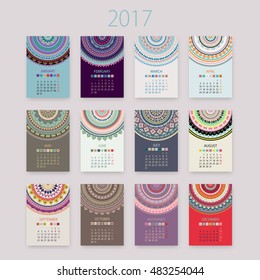Abstract 2017 vector calendar with circle ornament mandala. Monday is the first day of week