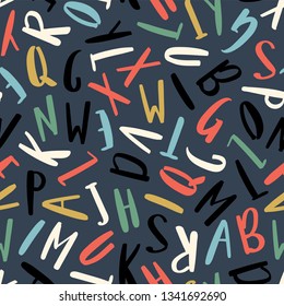 Abstract alphabet seamless pattern in handwritten style. Colored letters in doodle style.