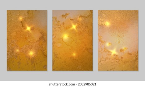 Abstract amber yellow and gold alcohol ink pattern with marble texture. Set of luxury backgrounds with watercolor splash for poster, flyer, brochure design. Modern fluid art with golden glitter.