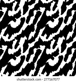 Abstract animal print seamless pattern in black and white, camouflage clothing. Spots, lines. Spotted repeating background texture. Cloth design. Wallpaper, wrapping