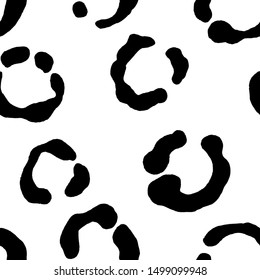 Abstract animal seamless pattern. Black and white graphic drawing. Design for wallpaper, wrapper, packaging.