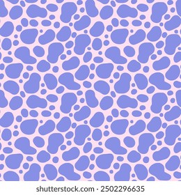 Abstract animal seamless pattern with irregular hand drawn blue shapes on a pink background. Vector simple spotted design