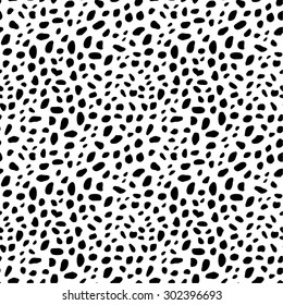 Abstract animal skin background. Black and white spots texture. Seamless dots pattern