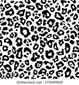 Abstract animal skin, leopard seamless pattern. Jaguar or cheetah fur. Black and white seamless camouflage background. Vector