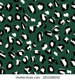 Abstract animal skin leopard seamless pattern design. Jaguar, leopard, cheetah, panther fur. Seamless camouflage background. funny drawing Lettering poster or t-shirt textile graphic wild design. Spot