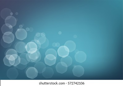 Abstract aquatic blue bokeh background with glowing sunbeams