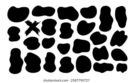 Abstract arrangement of amoeba-shaped black spots on white background, one marked with a dark 'X', creating a unique pattern or background for creative projects