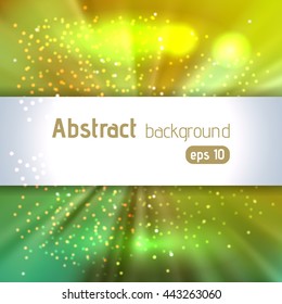 Abstract artistic background with place for text. Color rays of light. Original sparkle design. Yellow, green colors.  