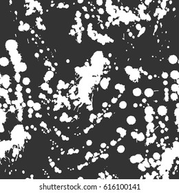 Abstract artistic paint splashes and blots seamless pattern. Black and white hand drawn splash textured background. Design for print, fabrics, textile, wrapping paper, wallpaper. Vector illustration.