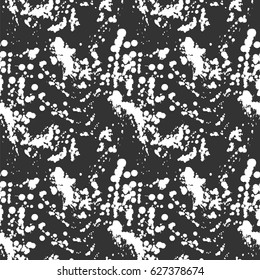 Abstract artistic paint splashes and blots seamless pattern. Black and white hand drawn splash textured background. Design for print, fabrics, textile, wrapping paper, wallpaper. Vector illustration.