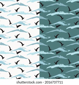 Abstract artistic seamless pattern. Hand painted grunge design, doodle paint brush lines, wave in blue marine color palette, black seagull silhouette. Transparent background. Vector illustration