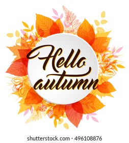 Abstract autumn banner with orange and yellow falling leaves. "Hello autumn" lettering.