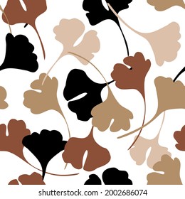 Abstract autumn foliage seamless pattern with ginkgo biloba leaf silhouettes in earth tone colors. Vector for fashion design, printing, textile, fabric, wallpaper, organic fall background