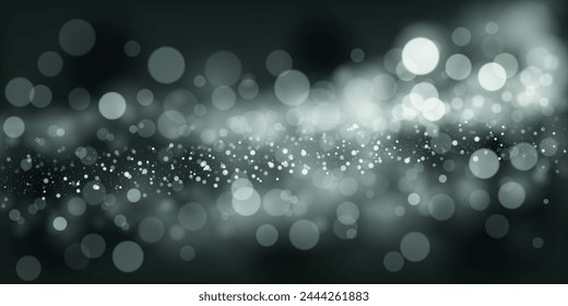 Abstract background in black and gray tones with many shiny sparkles, some of which are in focus and others are blurred, creating a captivating bokeh effect.