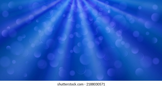Fondo abstracto en colores azules con divergentes rayos de luz y pequeños círculos translúcidos con efecto bokek