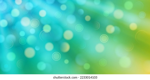 Abstract background in blue and green colors with diverging rays of light and small translucent circles with bokeh effect