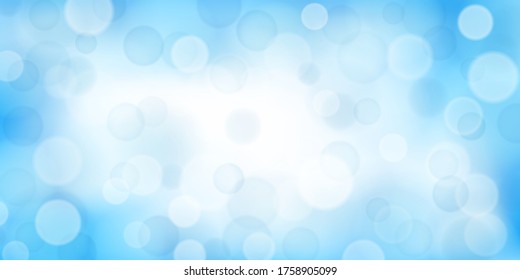 Abstract background with bokeh effects in light blue colors