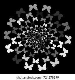 Abstract background of butterflies flying in a circle. Black, white, pattern, movement.