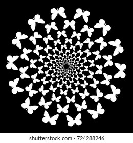 Abstract background of butterflies flying in a circle. Black, white, pattern, movement.