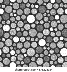 Abstract background with circles. Black and white grainy design. Stippling effect. Vector illustration. Pointillism pattern. 