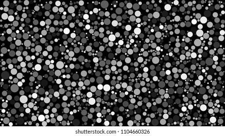 Abstract background of circles of different sizes in shades of gray colors on black background.