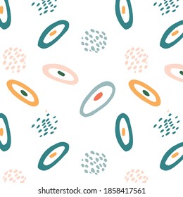 Abstract background with colored ovals and dots, Memphis art style, bright and colorful for pattern on textiles, paper and gift packaging
