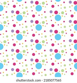 Abstract background with colorful circle shapes scattered on a white background is often used as a pattern on fabrics, rugs, bedspreads, handkerchiefs, tablecloths, dresses, tiles, gift wrap, paper.