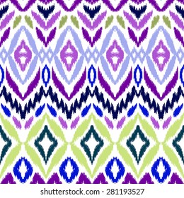 Abstract background. Colorful Ikat seamless pattern for textile, wallpaper, card or wrapping paper.