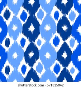 Abstract background. Colorful Ikat seamless pattern for textile, wallpaper, card or wrapping paper.