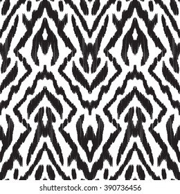 Abstract background in the ethnic style. Black and white Ikat seamless pattern for textile, wallpaper, card or wrapping paper.