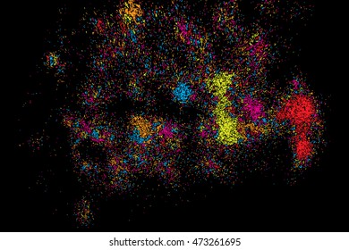 Abstract background, falling confetti. Many random tiny glitter pieces. Golden, red, blue and violet glitter Christmas random blow patterns. Abstract sparkle glittering background. Holiday texture. 