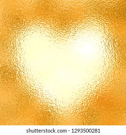 Abstract background of golden foil with a heart