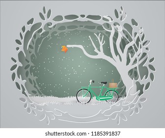 Abstract background with Green bicycle on the gray grass  in winter season,paper craft style and illustration