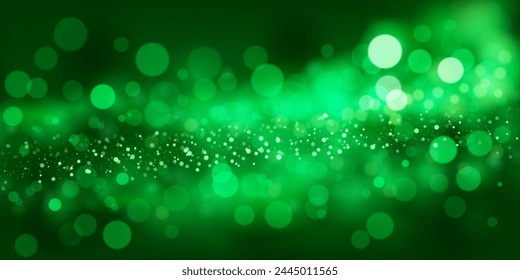 Abstract background in green tones with many shiny sparkles, some of which are in focus and others are blurred, creating a captivating bokeh effect.