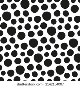 Abstract background with handwritten polka dots. Pattern in hand-drawn black and white circles for cover design. Simple seamless geometric spotted texture for design of speckled fabric, modern textile