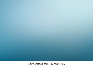 An abstract background image with gradual blue walls from soft light tones to dark tones that can be used as a backdrop.