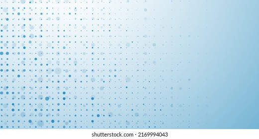 Abstract background in light blue colors made of big and small dots