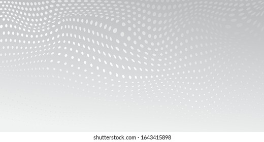 Abstract background made of halftone dots in white and gray colors
