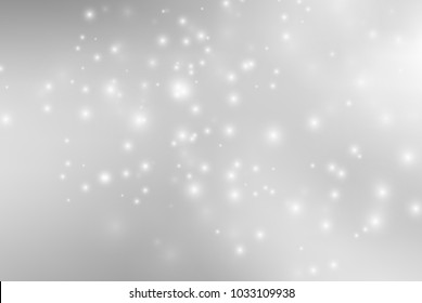 Abstract background with magic effect. Blurred defocused lights in white colors