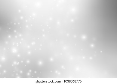 Abstract background with magic effect. Blurred defocused lights in white colors