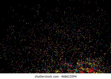 Abstract background with many splattered falling round glitter pieces. Sprinkle random pattern, confetti blow. Colorful celebration background with confetti isolated on black, holiday illustration.