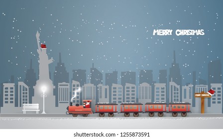 Abstract background Merry Christmas with Santa Claus driving the train coming to New York City and Statue of Liberty wearing a Santa hat  in USA in winter,paper art and vector style