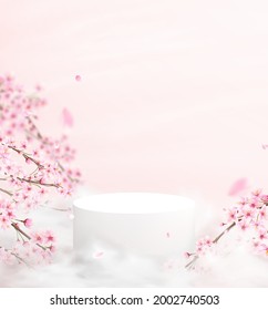 Abstract background in a minimalistic style with a podium in pink colors. Empty pedestal for product display with cherry blossoms and petals.