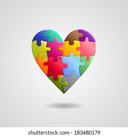 Abstract background multicolor puzzle heart 