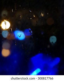 An abstract background with night lights and raindrops. Not auto-trace.