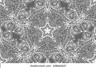 Abstract background with openwork elements. Complicated mandalas. Repeated pattern. Seamless texture. It can be used as wallpaper, upholstery, wrapping, fabric or your design.
