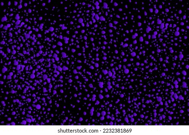 Fondo abstracto de las manchas púrpura sobre un fondo negro