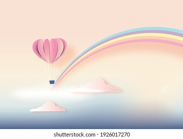 Abstract background with rainbow and paper heart balloon in pastel cloudy color sky