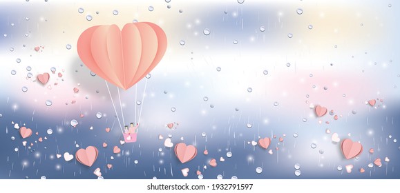 Abstract background with rainbow and paper heart balloon in pastel cloudy color rainy sky.