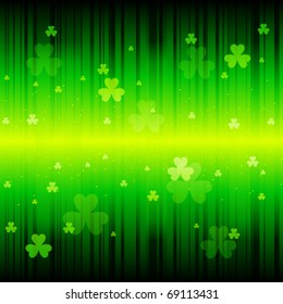 Abstract background with rays of light and shamrocks